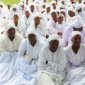 Members of the Vapostori worshiping at a shrine in Harare ( photo: M. Chibaya)