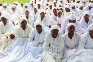 Members of the Vapostori worshiping at a shrine in Harare ( photo: M. Chibaya)