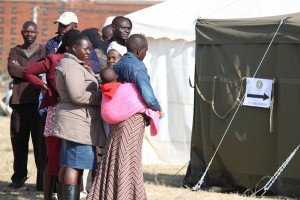 People waiting outside a polling station in Highfields Harare (photo:M.Chibaya).