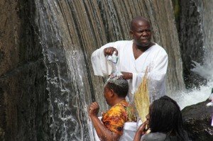 Madzibaba using milk to baptise followers (photo: S. Mlambo).